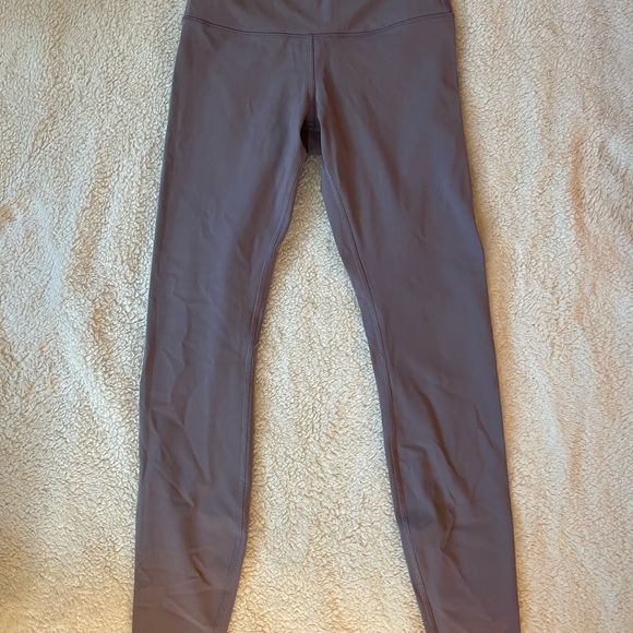 Light purple Wonder Under Lululemon leggings.